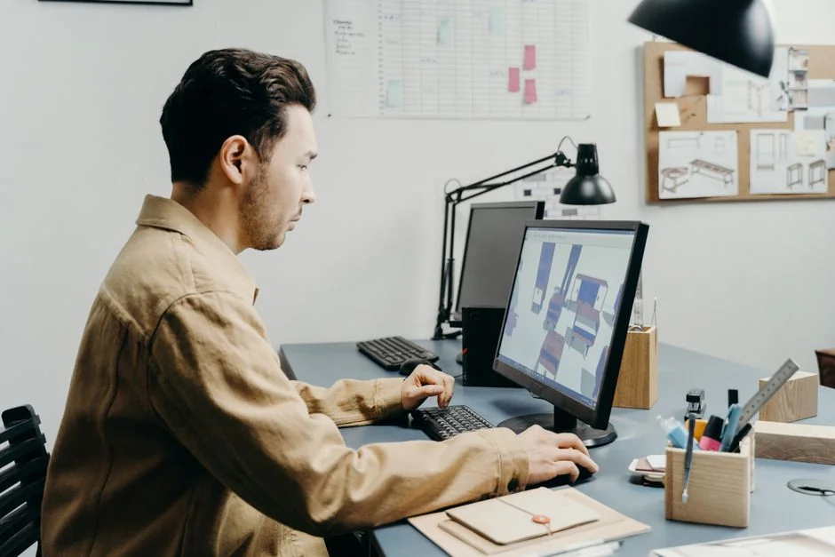 A contemporary workspace showcasing a laptop, tablet, and smartphones, ideal for tech and freelance use.